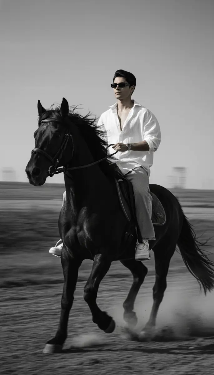 Black and White Portrait of Stylish Man Riding Horse