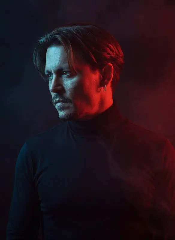 Moody Portrait of a Man with Dramatic Red and Blue Lighting