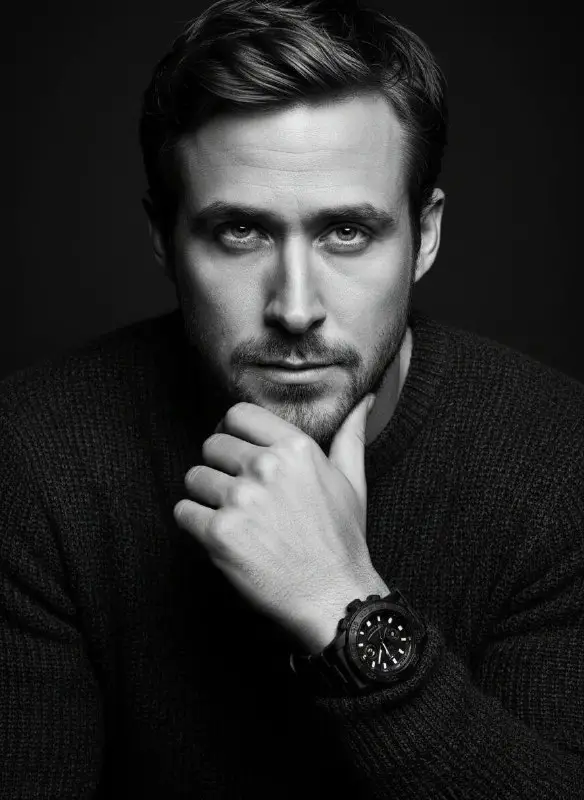 Dramatic black and white portrait of a man with watch