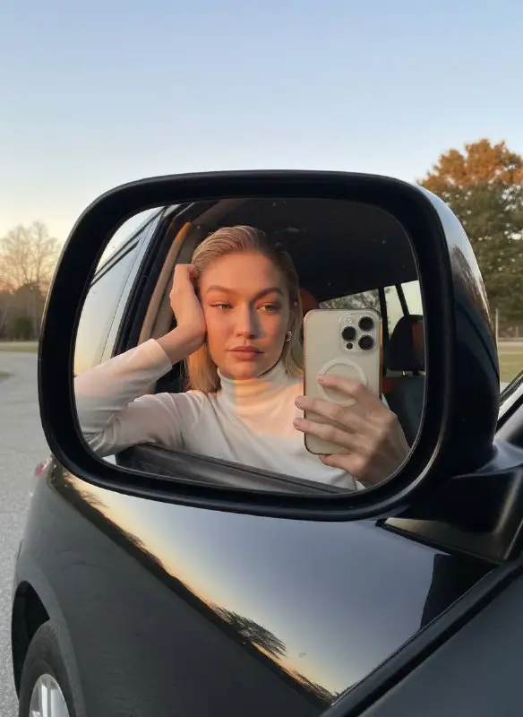 Blonde Woman Taking Aesthetic Mirror Selfie in Car Side View Mirror