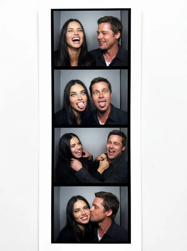 Candid photo booth strip of a playful young couple laughing