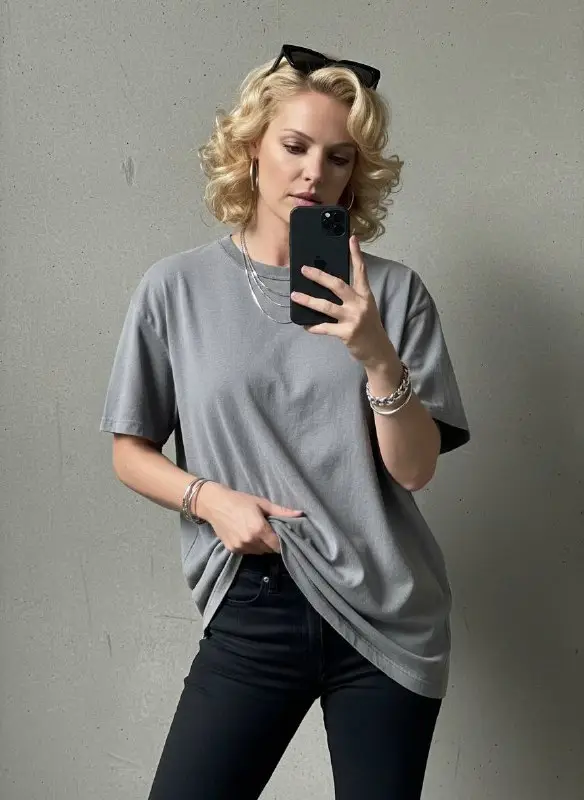 Blonde Woman in Grey Oversized T-shirt Taking Mirror Selfie