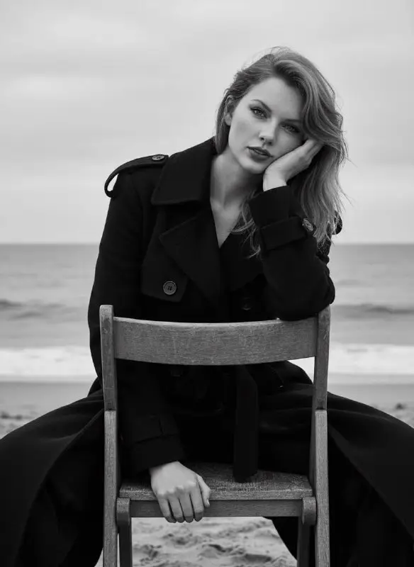 Black and White Portrait of Woman Sitting on Beach Chair
