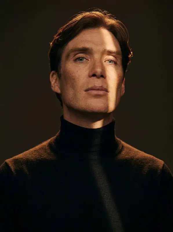 Dramatic Portrait of Serious Man with Intense Lighting and Shadows