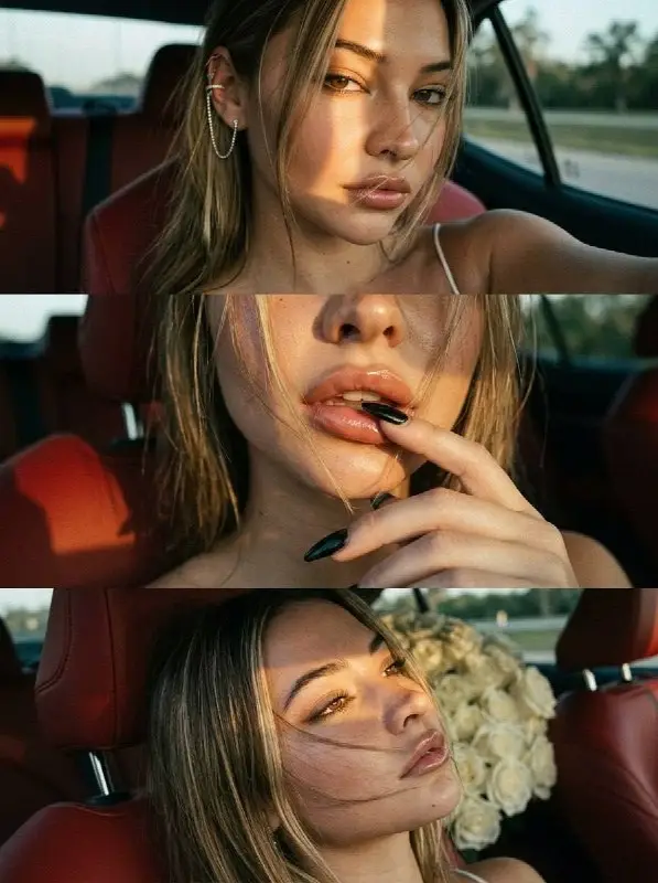 Young woman taking golden hour selfies in car with red seats